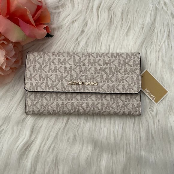 Michael Kors Handbags - NWT vanilla MK MICHAEL KORS jet set trifold wallet